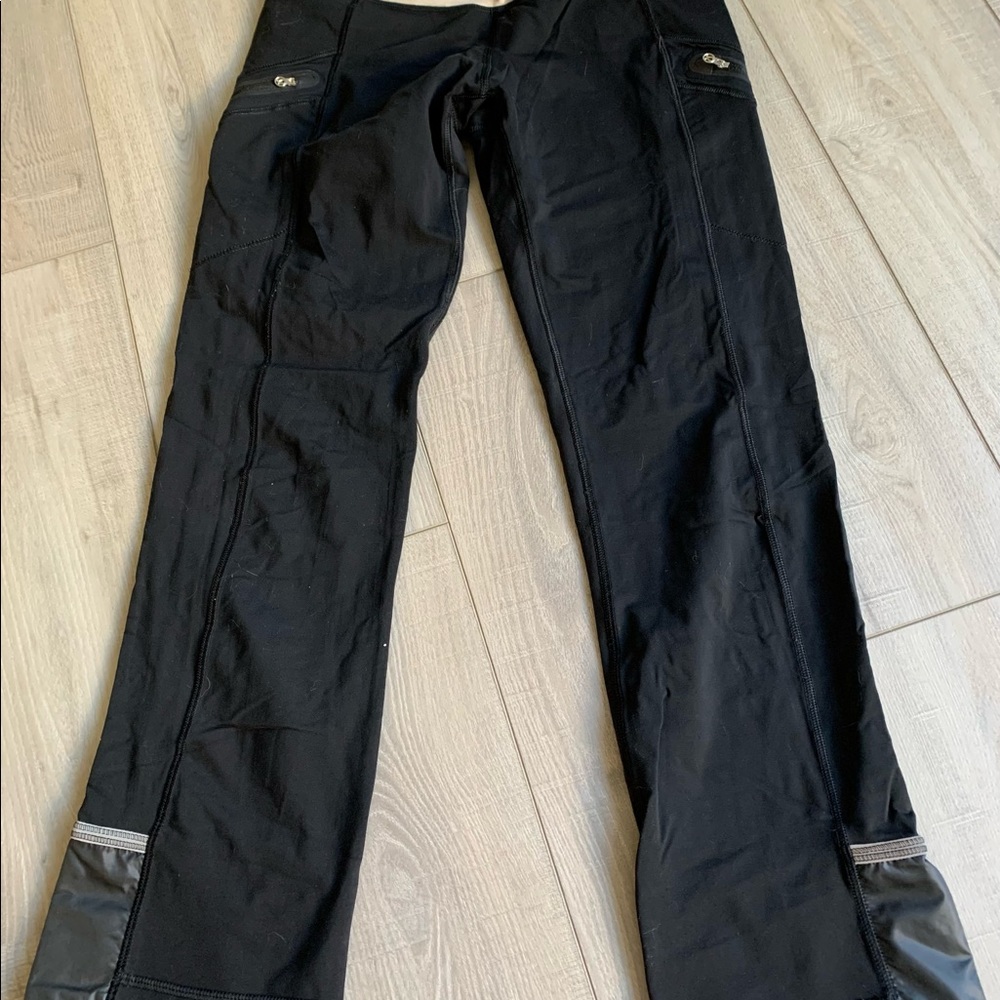 Lululemon athletica black cropped leggings with reflective bands at bottom sz 6